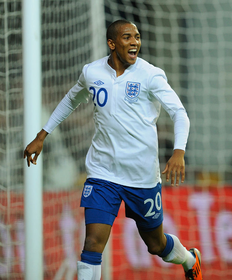 Ashley Young celebrates his first England goal, against Denmark in Copenhagen.